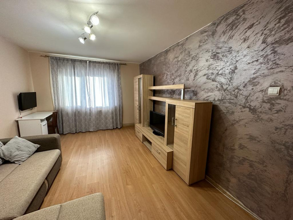 Apartament de inchiriat, compus din 2 camere situat in zona DACIA - INTERSECTIE